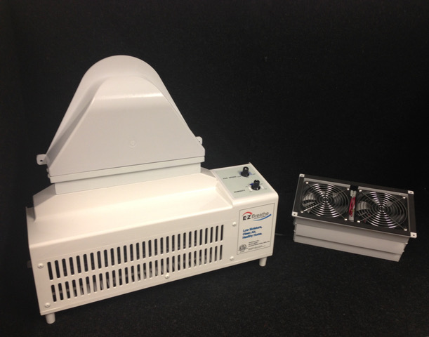 EZ Breathe Ventilation System unit with control panel and attached fan, designed for improving indoor air quality in residential spaces.